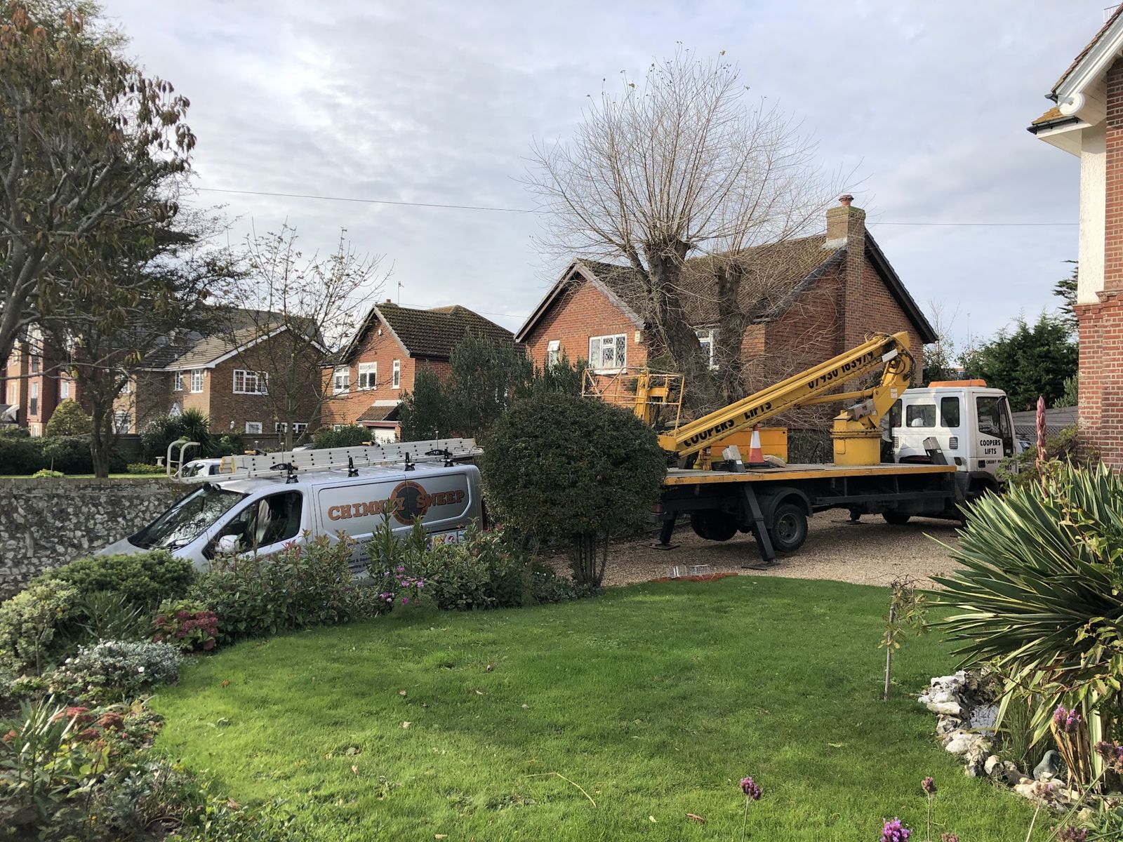 James's van and access platform set up outside a house