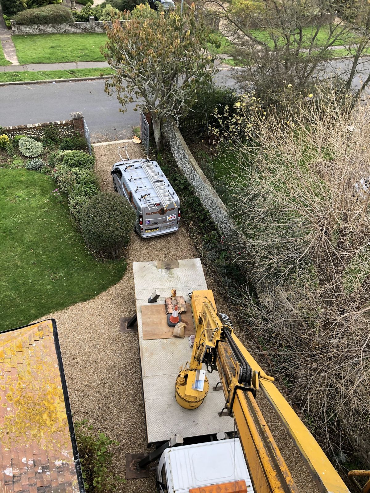 View from the top of the platform down to the van parked below